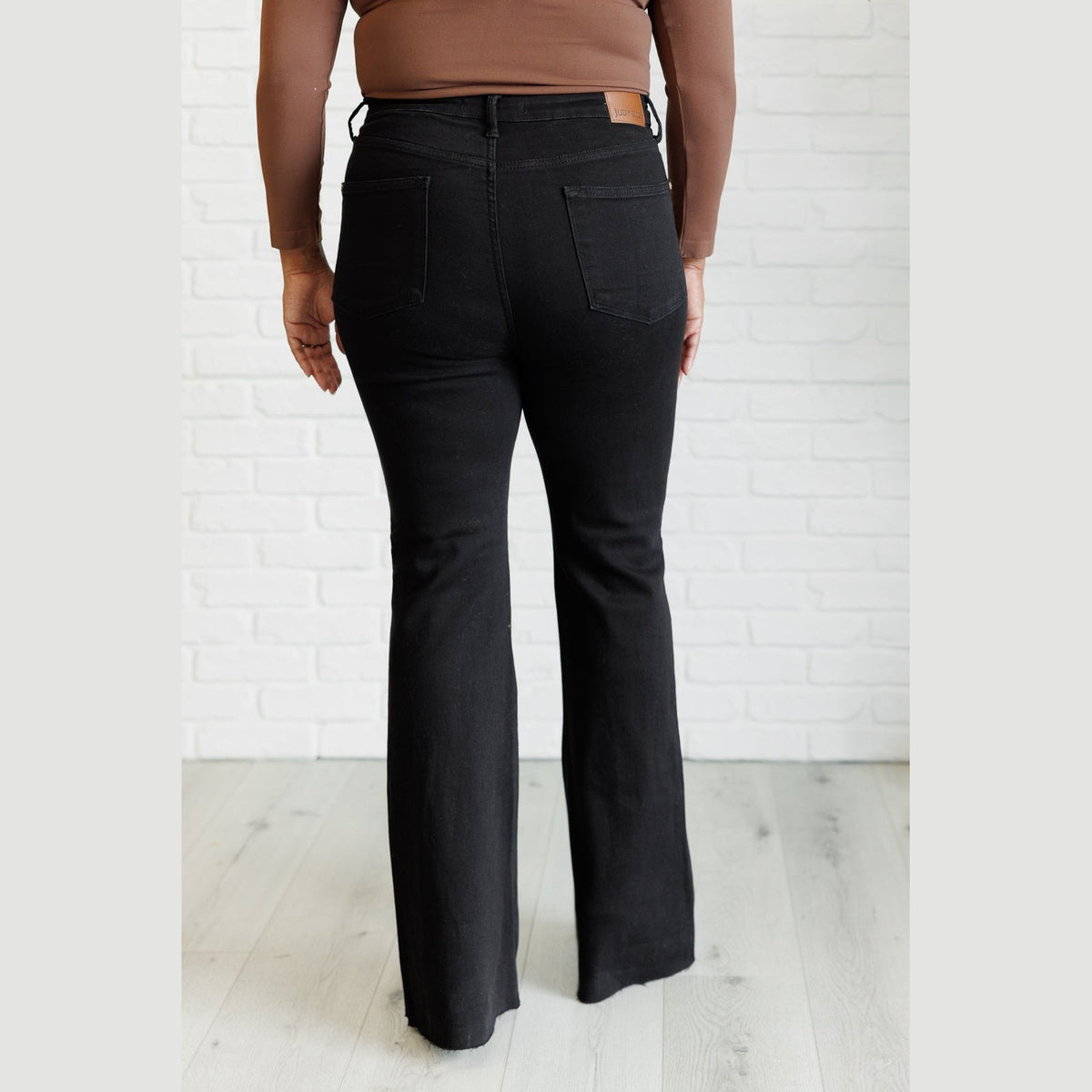 Etta High Rise Control Top Flare Jeans in Black